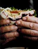 person with big sandwich
